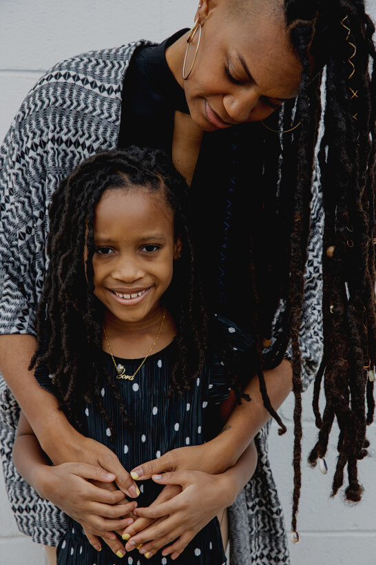 Mother Hugging Daughter